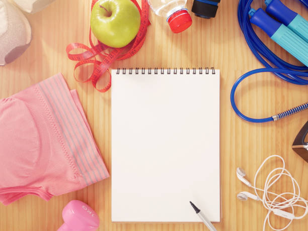 istock Sports Equipment with copy space on notebook for Presentations and Web Design. A Lot of Space for Text Composition art image, website, magazine or graphic for commercial fitness design 837560090