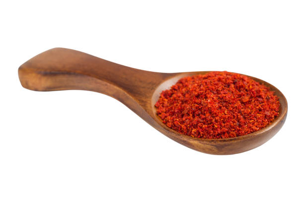 istock Red paprika pepper in a wooden spoon 837566542