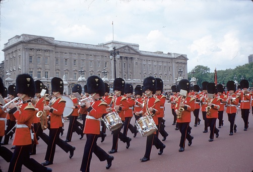 London, England, UK, 1972. The famous Changing the Guard at the Buckingham Palace. . With every change of guard, the garde chapel accompanies the grenadiers to the Buckingham Palace and back to the barracks.