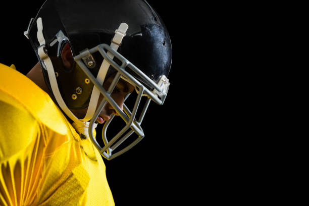 istock American football player with a head gear 837580806