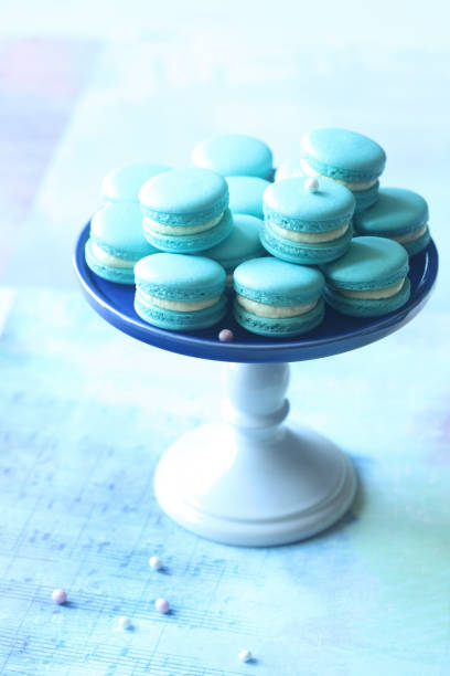 istock Blue Macarons with Cream Cheese and Blueberry Filling 837588034