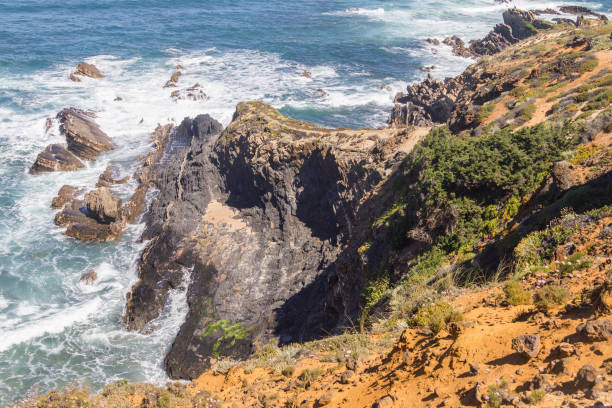 istock Wave and cliffs in the Beach in Almograve 837588668