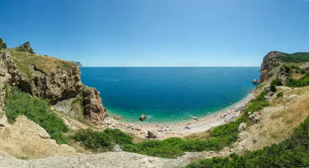 Panorama of Balaklava beach Crimea Black Sea. Azure water