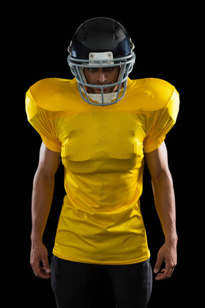 istock American football player with a head gear 837600688