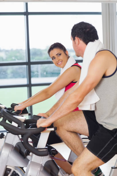 istock Young woman and man working out at exercising class 837614490
