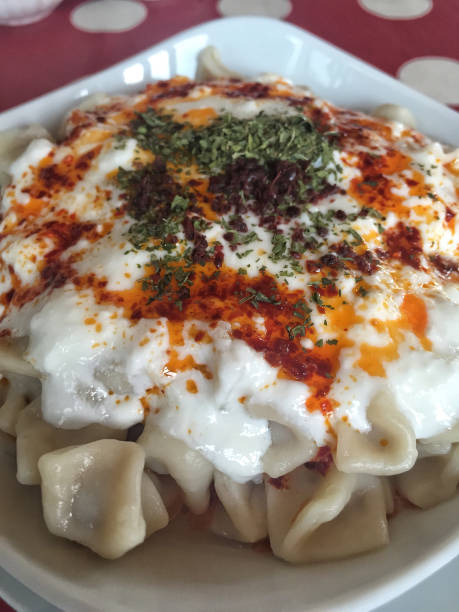 istock Turkish ravioli served with natural yogurt 837619036