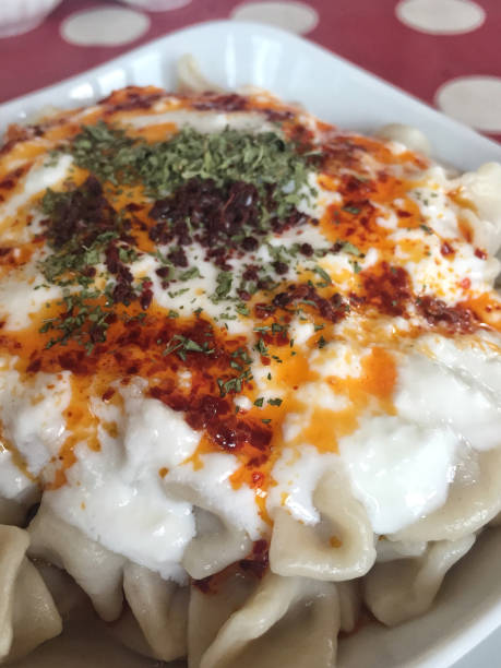 istock Turkish ravioli served with natural yogurt 837619054