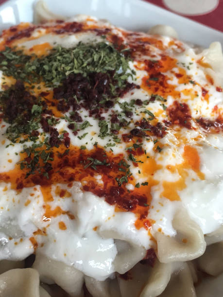 istock Turkish ravioli served with natural yogurt 837619084