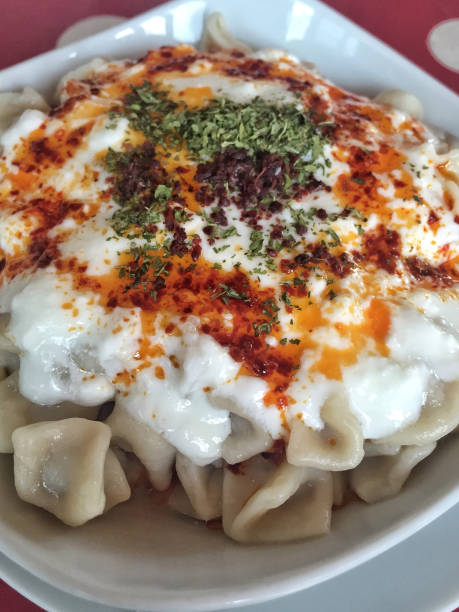 istock Turkish ravioli served with natural yogurt 837619092