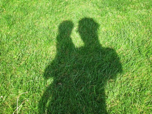 istock Shadow of mother and child 837619130