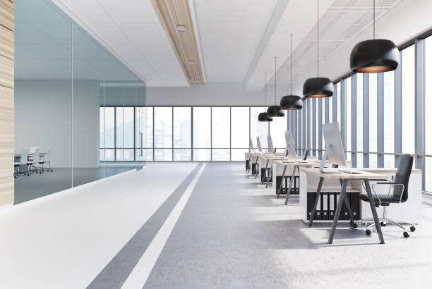istock Open office interior with black round lamps 837627116