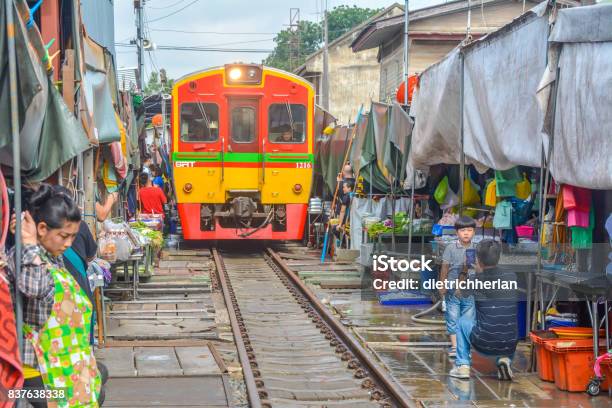 Train Market In Maeklong In Thailand Stock Photo - Download Image Now - Market - Retail Space, Bangkok, Train - Vehicle