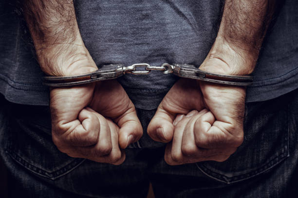 Handcuffs Arrested man in handcuffs 2017 photos stock pictures, royalty-free photos & images