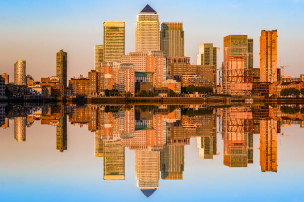 istock Sunset at Canary Wharf and its reflection from river Thames 837651992