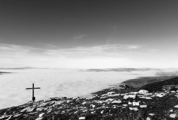istock Assisi, cross and fog 837653574
