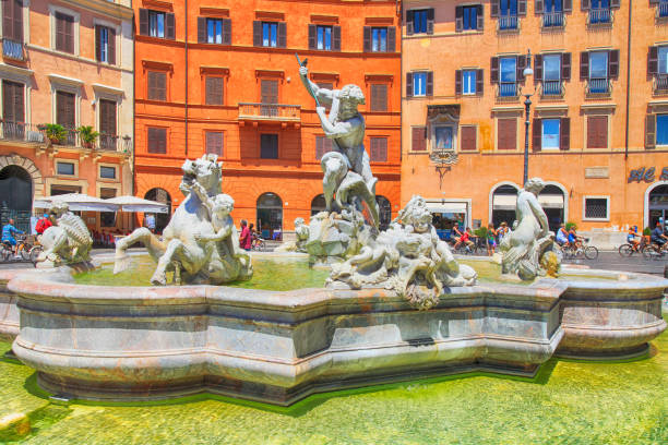 fontana del nettuno (fountain of neptune) in piazza navona, rome, italy - piazza del nettuno imagens e fotografias de stock