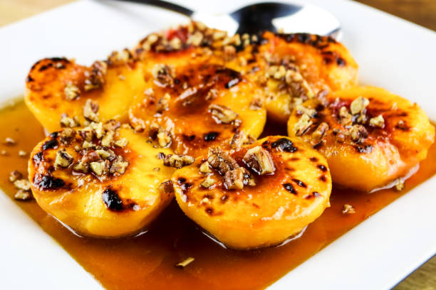 istock Honey Glazed Peaches with Toasted Nuts 837677478