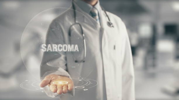 Doctor holding in hand Sarcoma 120 Concept of application new technology in future medicine adenocarcinoma photos stock pictures, royalty-free photos & images