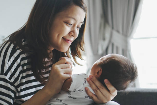 istock Mother kissing her child 837712164