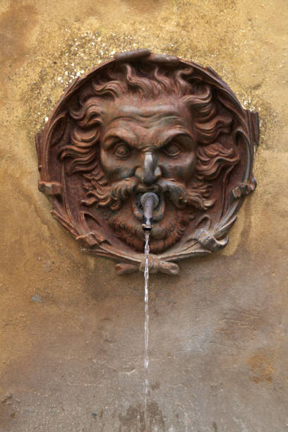 istock medieval street drinking fountain, Italy. 837725666