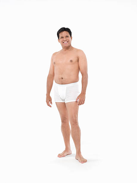 invecchiamento naturale del corpo maschile - biancheria intima foto e immagini stock