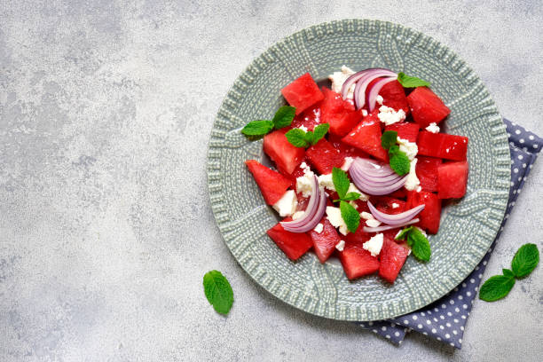 istock Watermelon salad with feta and red onion 837745562