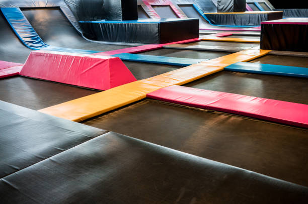 Interconnected trampolines for indoor jumping stock photo