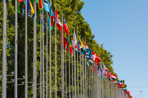 istock Outdoors Park Area International Flag DIsplay Blue Sky Background 837768828