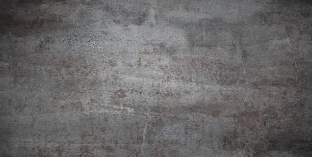 Grunge metal background or texture with scratches and cracks