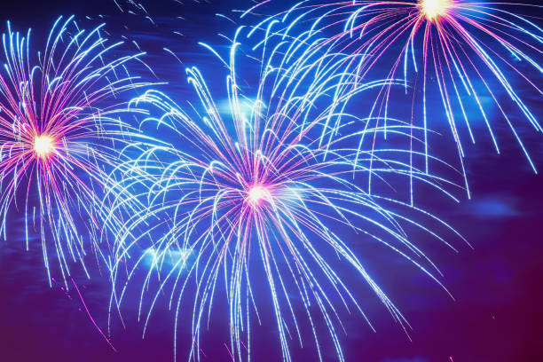 istock Close-up of vivid blue fireworks with sparks. Explosive pyrotechnic devices for aesthetic and entertainment purposes, art. Colored fireworks, holiday background 837773476