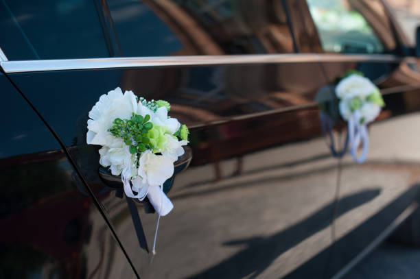 istock Boutonniere on the wedding car handle 837780594