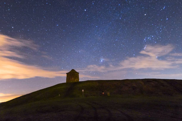 istock starry sky with beautiful orion nebula on top of a park 837781732