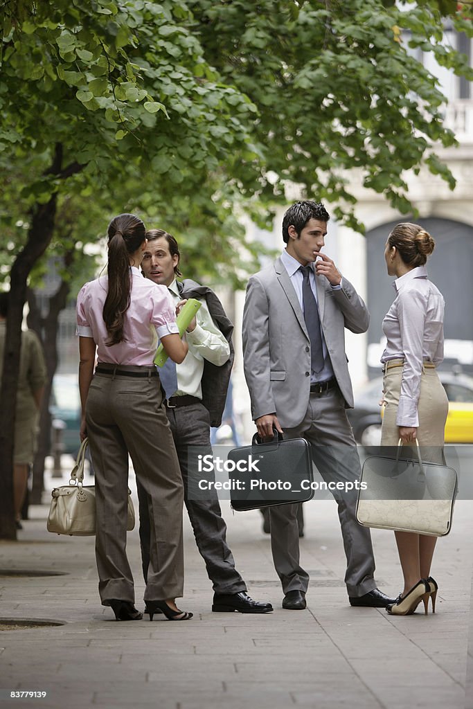 Business team talking on street Barcelona, Spain Outdoors Stock Photo