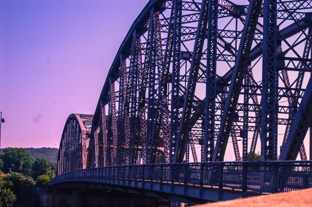 istock Truss Bridge In Front Of Purple Sky 837810712