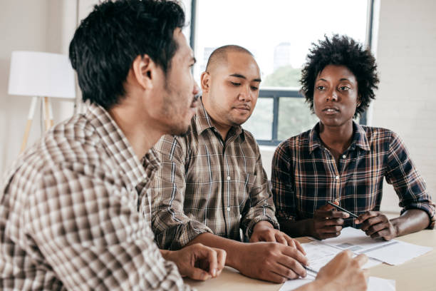 istock Mortgage broker and a couple 837829008