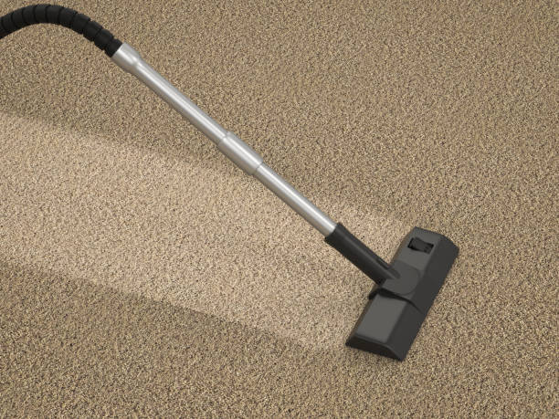 istock vacuum cleaner on brown carpet 837834704