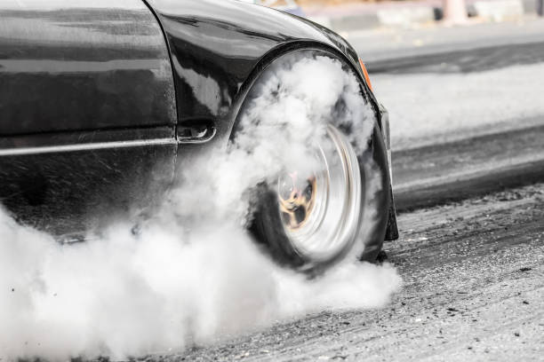 istock Front wheel drive drag racing car at start line 837866696