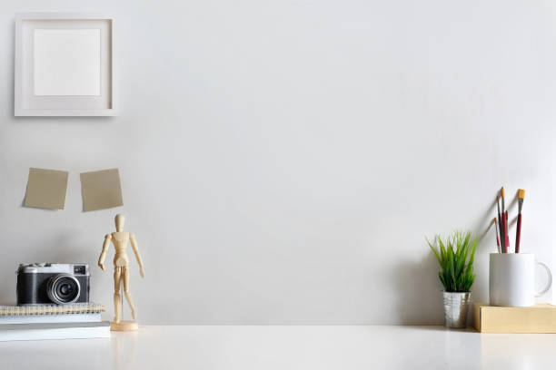 istock Mock up modern home decor with camera, dummy, houseplant. Artist workspace with copy space for products display montage.. 837944328