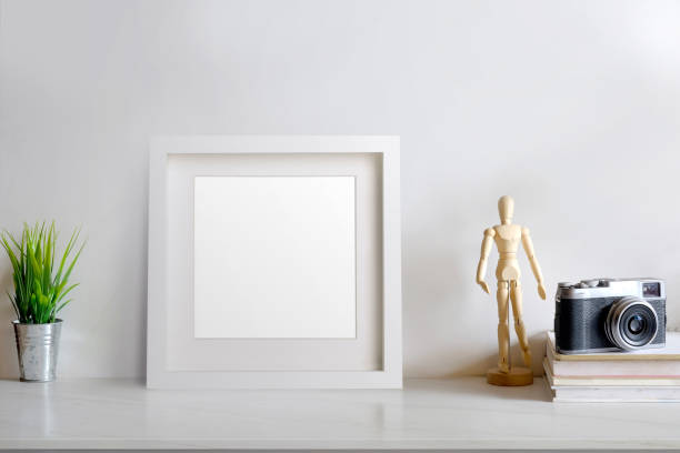 istock Mock up modern home decor with camera, dummy, houseplant. Artist workspace 837944946