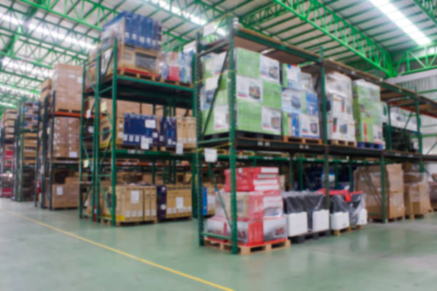 istock Stack of carton at logistics warehouse. Blur picture 837956670