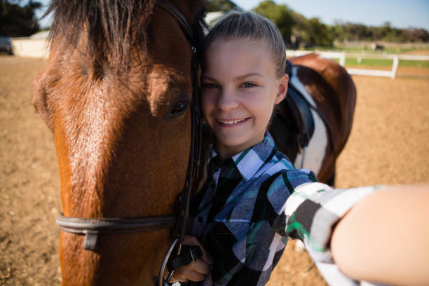 istock Girl taking a selfie with horse 837963652