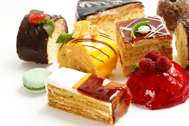 istock Assorted mini cakes sweet dessert, chocolate and fruit 837970478