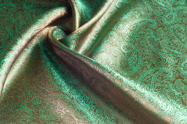 istock green silk fabric texture, salad coloring 837984084