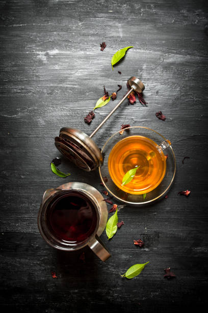 istock Fresh brewed tea with green leaves. 838003334