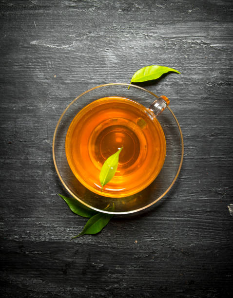 istock Cup of tea with green leaves. 838003650