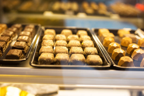 Chocolate dipped cherries and luxurious chocolate pralines with nuts at a market in Barcelona, Spain