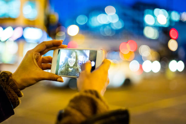 istock Female taking selfie with smart phone 838012230