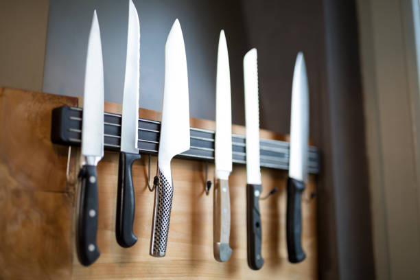 istock Set of kitchen knives hanging on the wall 838017726