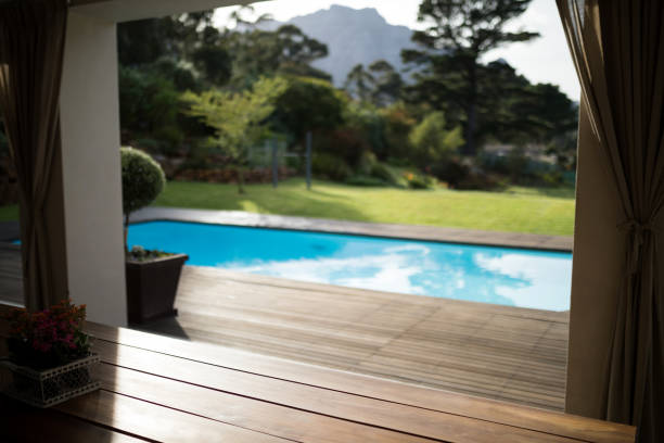 istock Swimming pool in the front yard of house 838019036