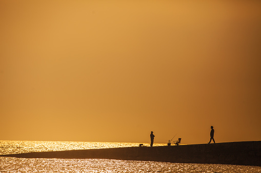 This Place is Eurwangni Beach, Incheon, Korea. Sunset ocean, fishing with friend, talk with friend, enjoy the moment.